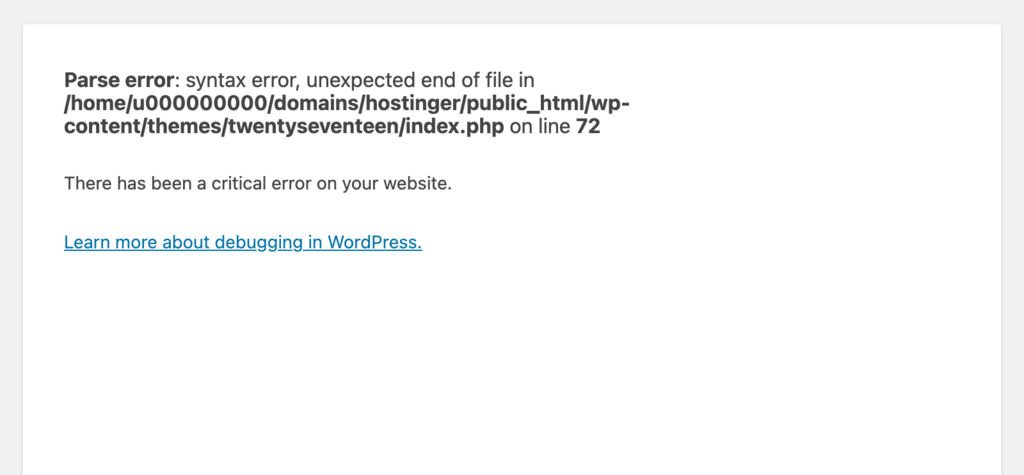 A syntax error message appears on the homepage.